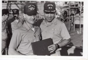 Lieutenant Junior Grade Michael Prokopis, left, aboard the USS Iowa