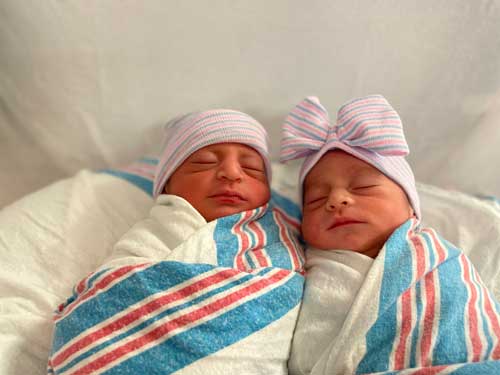 Older brother Santiago (left) and sister Melany (right) were born on 2.22.22.